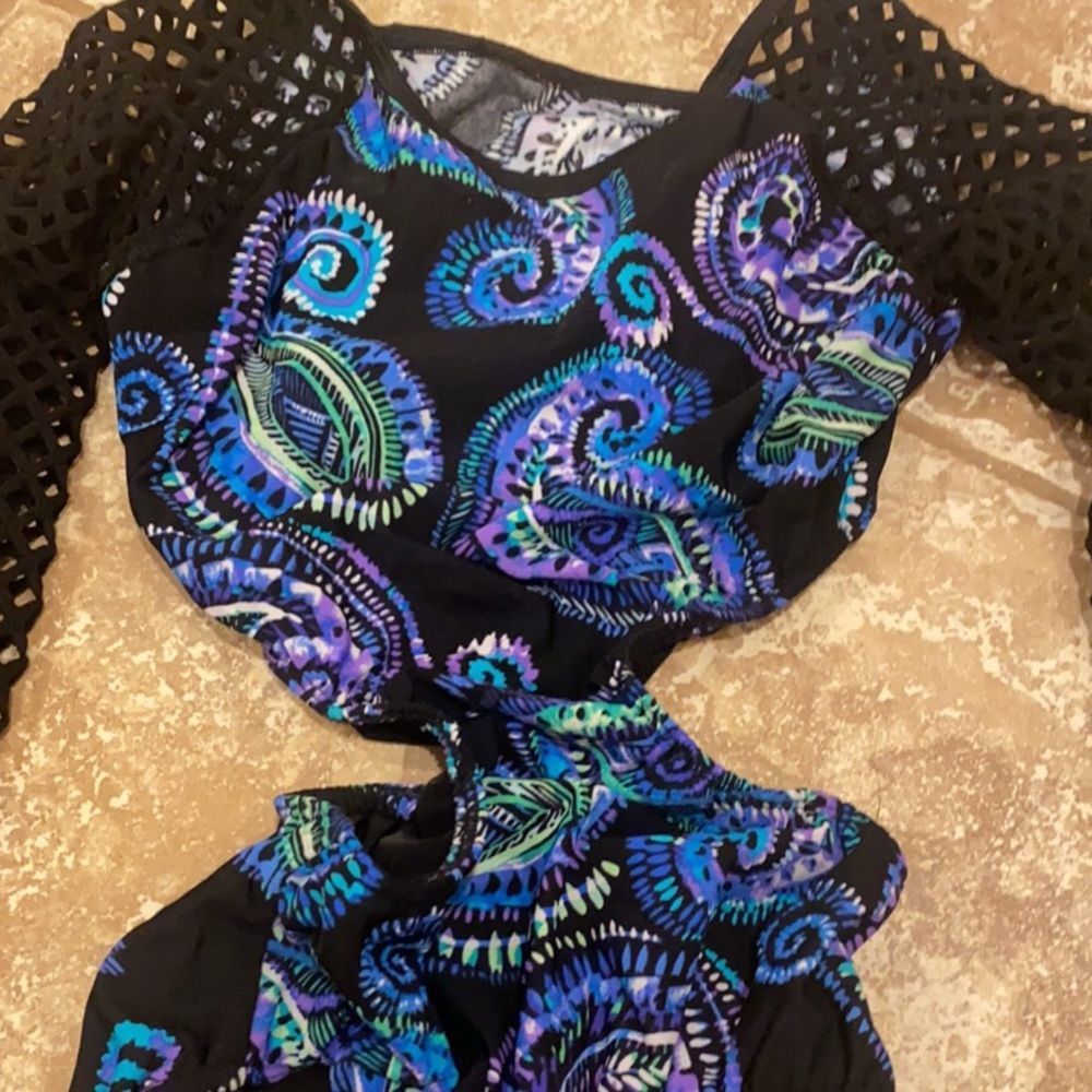 Super cute and custom Leo purple and black with cut outs. Gymnastics or dance